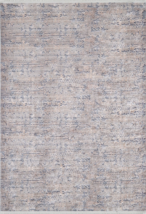 Load image 1 in gallery view. The Modern Enigma - Machine-Washable Rug JR1883 features a textured abstract pattern in grey, blue, and beige. Its subtle design, durable build, and slightly fringed edges make it ideal for high-traffic, modern neutral spaces.