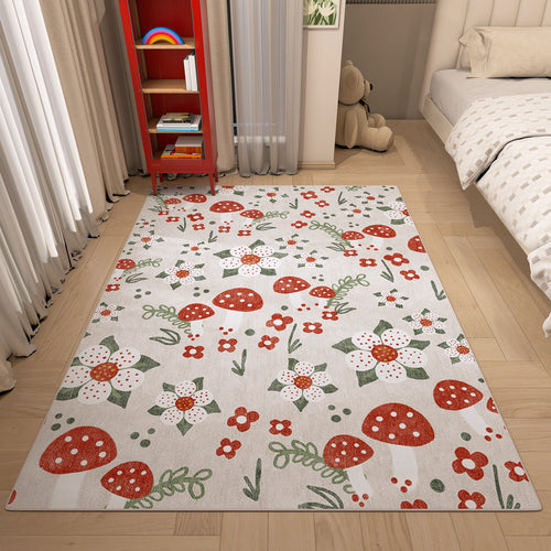 Load image 1 in gallery view. Off-white rug with a red mushroom and floral pattern, styled in a child's bedroom.