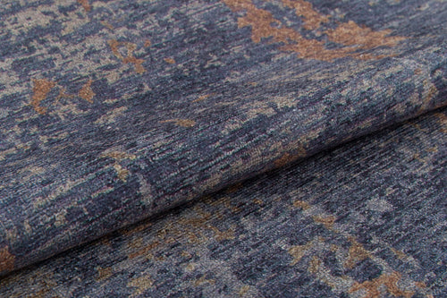 Load image 1 in gallery view. A close-up of the Mystical Mosaic - Washable Rug - JRS003 (Custom Size) shows its folded, textured fabric with a blue, gray, and tan mottled pattern. This washable rug’s subtle color and weave variations make it ideal for high-traffic spaces.
