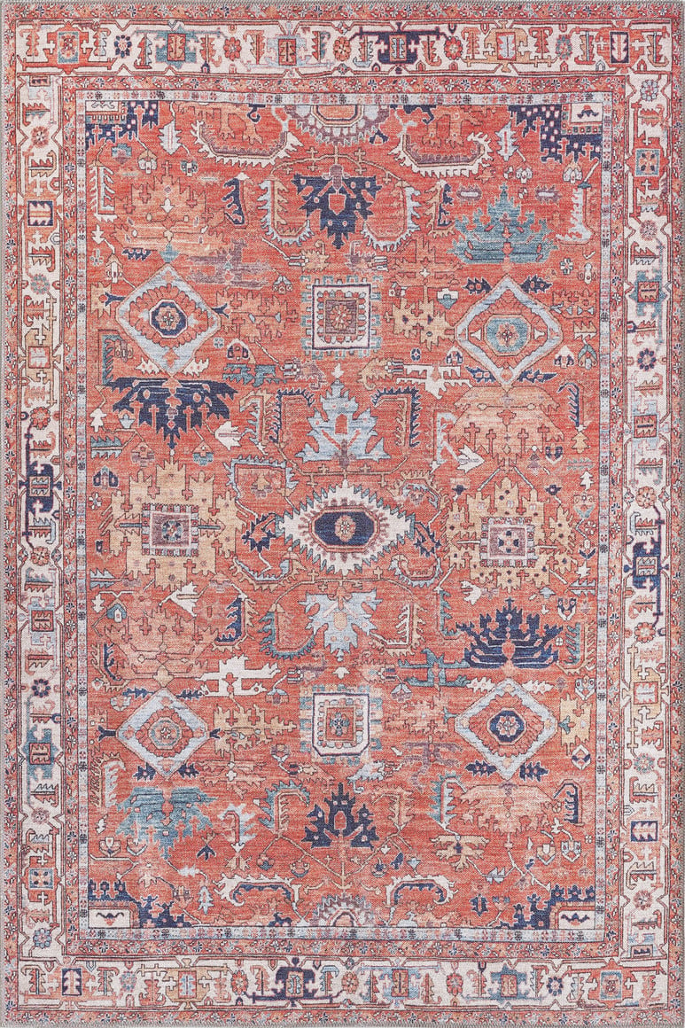 The Mystral Kilim-Design Coral Washable Rug (LCC3015) features Persian-inspired geometric motifs in rust, blue, cream, and navy with a detailed border—durable and perfect for high-traffic areas.