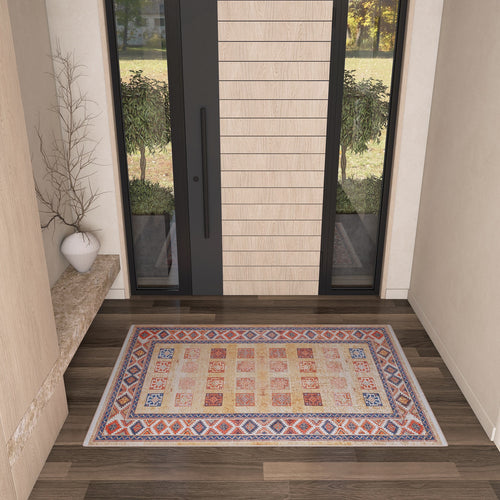 Load image 1 in gallery view. The Navajo Nights - Washable Rug - JR1758 (Custom Size), featuring bold geometric patterns in red, blue, beige, and orange accents, is showcased on dark wood flooring in a stylish entryway—ideal for high-traffic areas.