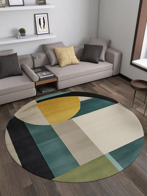 Load image 1 in gallery view. A modern living room with a gray sectional, neutral cushions, floating shelves, and the Nexus Geometric Contemporary Washable Rug - MDJ006 in yellow, green, black, beige, and teal—durable for high-traffic areas.