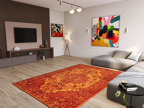 Load image 1 in gallery view. Modern living room with light wood floors, a large Noble Odyssey - Washable Rug - JRN1012 (Custom Size) in orange, gray sectional sofa, wall-mounted TV, abstract art, floor lamp, minimalist decor, and sunlight streaming through the window.
