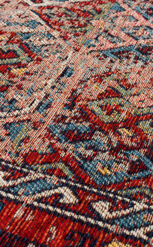 Load image 1 in gallery view. Close-up of Nomad Spirit - Washable Kilims - AND03 reveals its colorful flatwoven texture and intricate patterns in red, blue, green, and beige, highlighting the detailed design of this washable kilim fabric