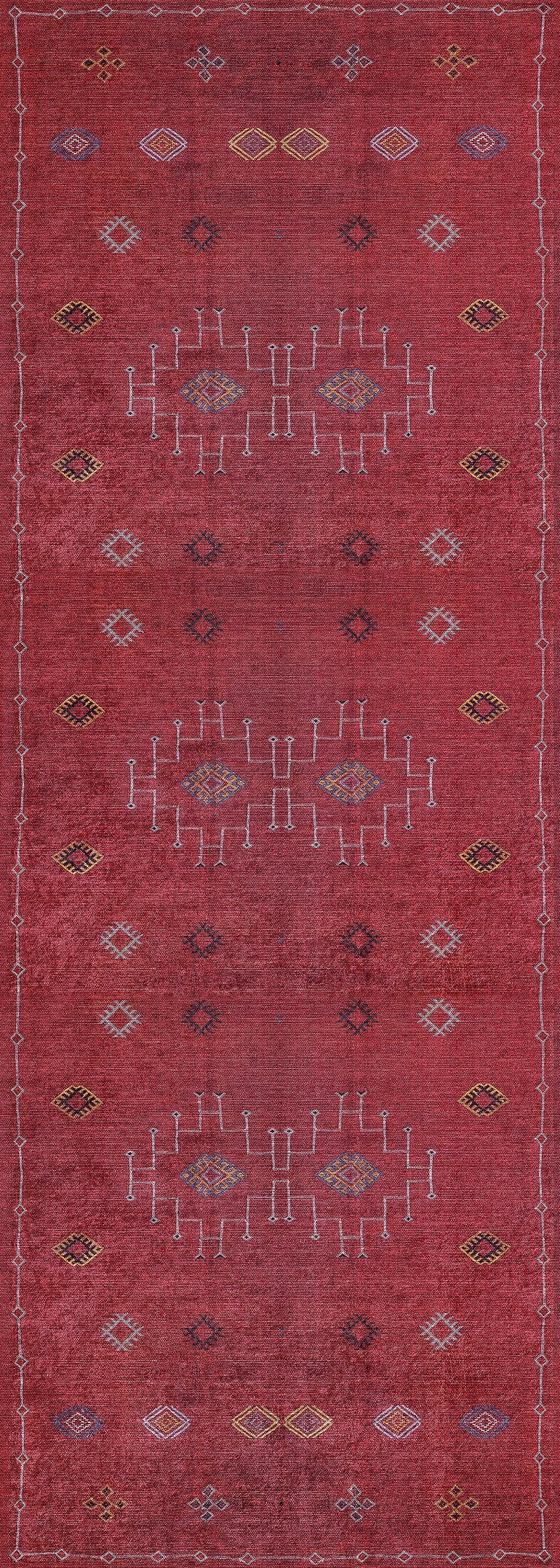 The Nomadic Journey - Washable Rug - JR5080 is a long red rug with a distressed look, featuring yellow, white, and blue geometric patterns, including white lines and diamond shapes. Durable for high-traffic areas and easy to clean.