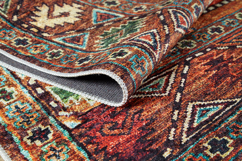 Load image 1 in gallery view. A close-up of the Nomadic Oasis - Washable Rug - JR5086 (Custom Size), featuring intricate geometric patterns in vivid red, orange, green, blue, and cream tones with detailed stitching—ideal for high-traffic areas.
