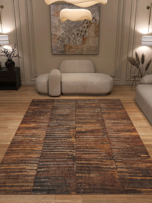 Bild 1 in Galerieansicht laden. A modern living room with beige walls, abstract art, a sculptural sofa, and the Nostalgic Weft - Washable Rug - JRN33 on wood floors. Contemporary decor and soft lighting create a stylish, durable space perfect for high-traffic areas.