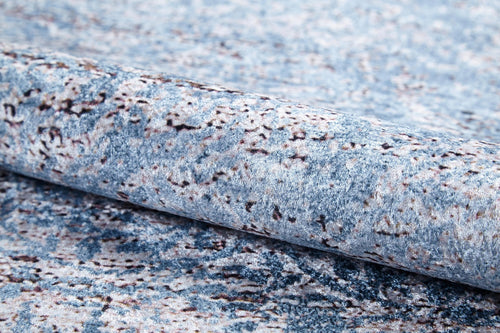Load image 1 in gallery view. A close-up of Old World Charm - Washable Rug - JR1606 (Custom Size), a blue and gray textured carpet with a speckled, abstract pattern—perfect for high-traffic areas.