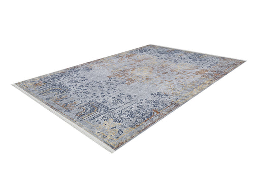 Bild 1 in Galerieansicht laden. The Oriental Treasures - Machine-Washable Rug JR1613 (Custom Size) is a durable flat weave rectangular area rug with a faded vintage-style pattern in blue, gray, and beige, subtle floral and geometric motifs, plus fringe on the shorter edges.