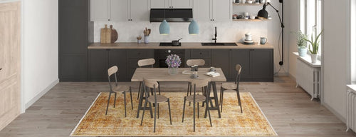 Bild 1 in Galerieansicht laden. Modern kitchen and dining area with a wooden table, six chairs, light wood floors, black and white cabinetry, pendant lights, large windows, and the Ornate Beauty - Washable Rug - JR206 in yellow—ideal for high-traffic spaces.