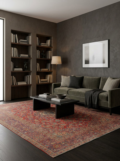 Load image 1 in gallery view. Red and blue traditional medallion rug with a distressed finish, styled in a dark-toned modern living room.