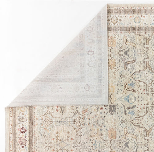 Load image 1 in gallery view. The Pearl Oushak - Area Rug - APX2931 is shown from above with a folded corner, highlighting its thinness and underside. This beige vintage rug features intricate, traditional Persian-inspired patterns in muted blue, brown, and beige tones.