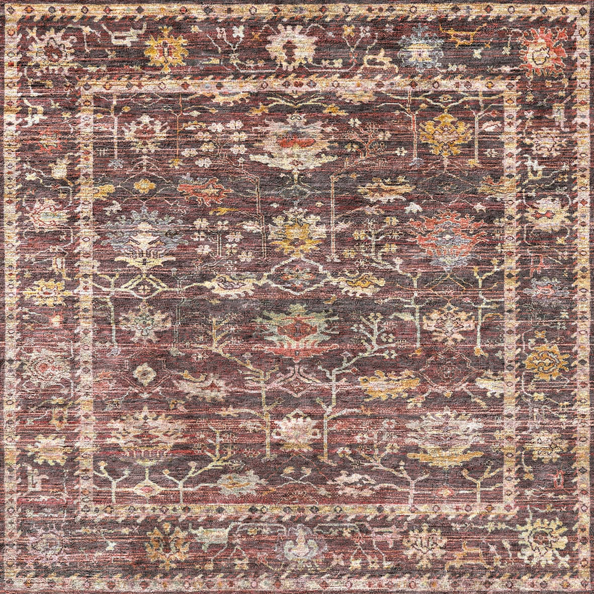 Dark burgundy traditional rug with a distressed floral medallion pattern and a decorative geometric border.