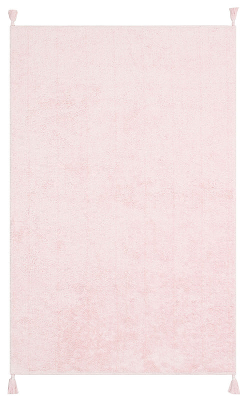 Load image 1 in gallery view. The Powder Calm - Washable Shaggy - CBNPLAIN is a rectangular, light pink washable rug with a soft shaggy texture and small corner tassels, shown on a white background.