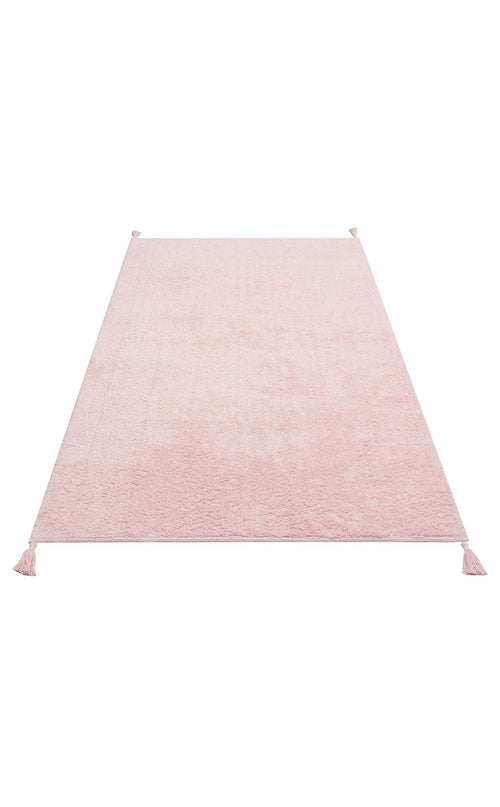 Load image 1 in gallery view. The Powder Calm - Washable Shaggy (CBNPLAIN) is a rectangular pink cotton rug with a soft texture and corner tassels, ideal as a modern bedroom accent, shown on a white background.