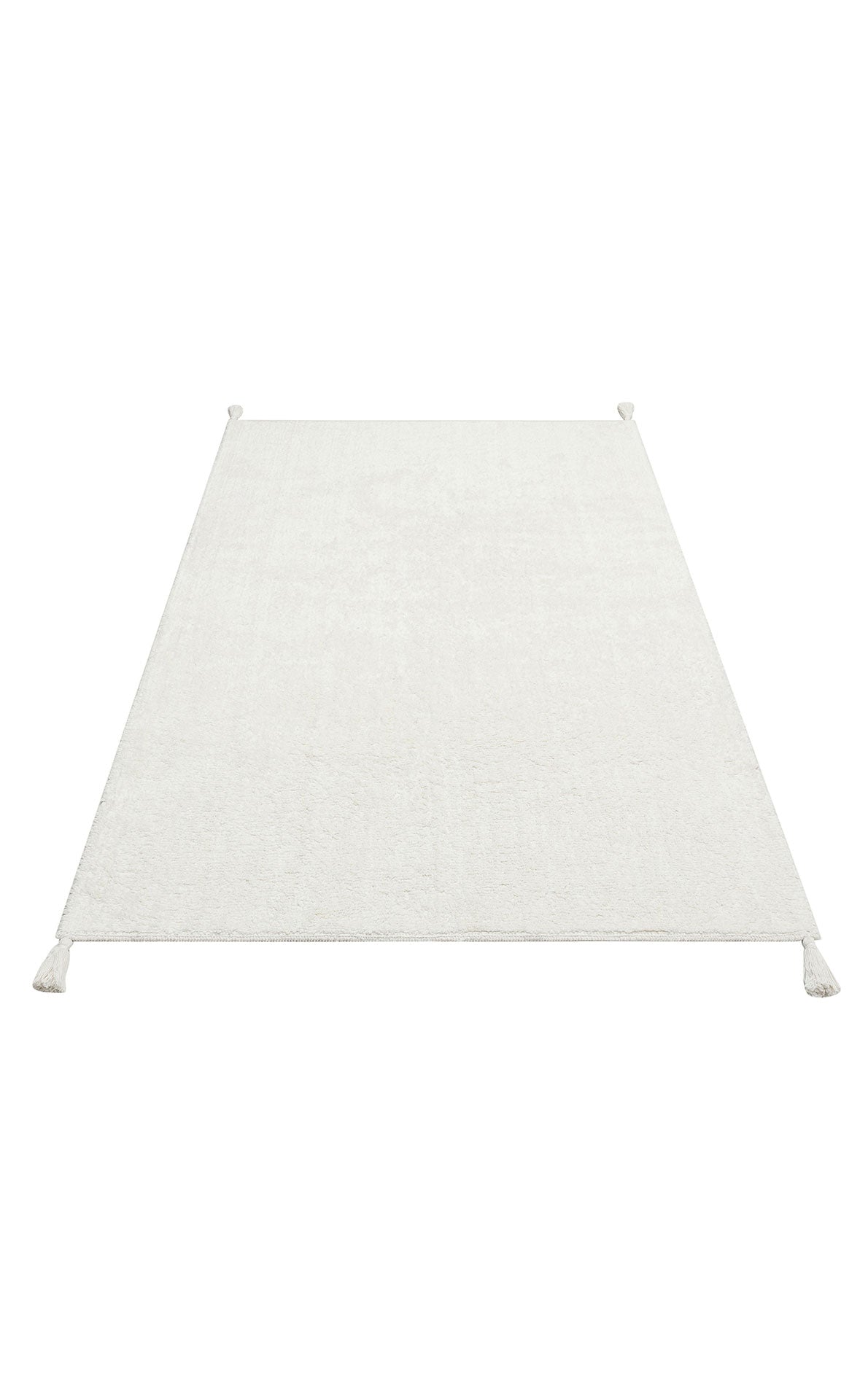 The Pure Thread - Washable Shaggy - CBNPLAIN is a rectangular, light-colored, machine-washable rug with subtle texture and corner tassels, displayed on a white background.