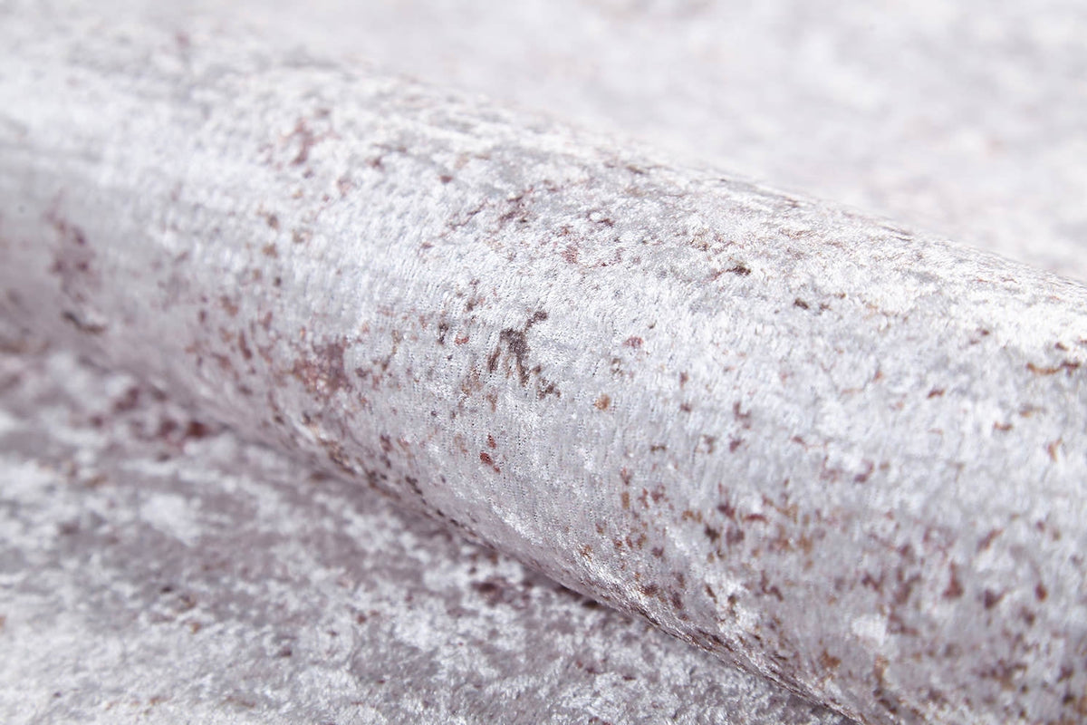 A close-up of Rustic Trails - Washable Rug - JR1736 (Custom Size) shows light gray crushed velvet fabric with a soft, textured, slightly shiny surface—ideal for washability and durability in high-traffic areas.