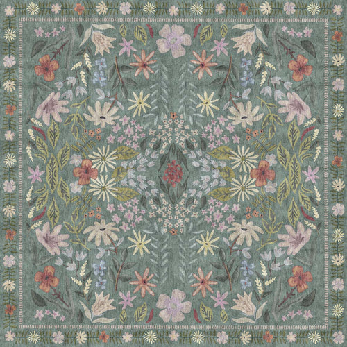 Load image 1 in gallery view. Sage green rug with a symmetrical floral pattern in muted pink, yellow, and cream, featuring a decorative border.