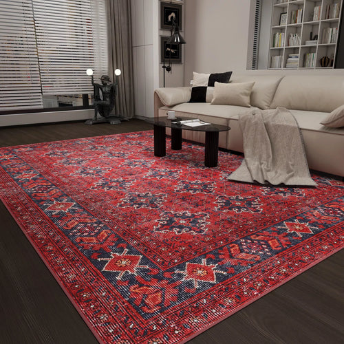 Bild 1 in Galerieansicht laden. A modern living room featuring the Scarlet Charm - Washable Rug - JRN1032, a light sofa with pillows and a gray blanket, glass coffee table, dark wood floors, bookshelves, and floor-to-ceiling windows with blinds—perfect for high-traffic spaces.
