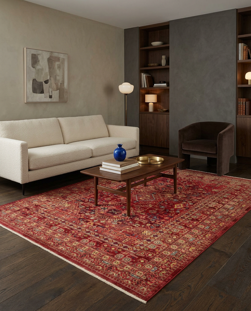 Load image 1 in gallery view. Red traditional Persian-style rug with intricate floral and geometric patterns, styled in a modern living room.