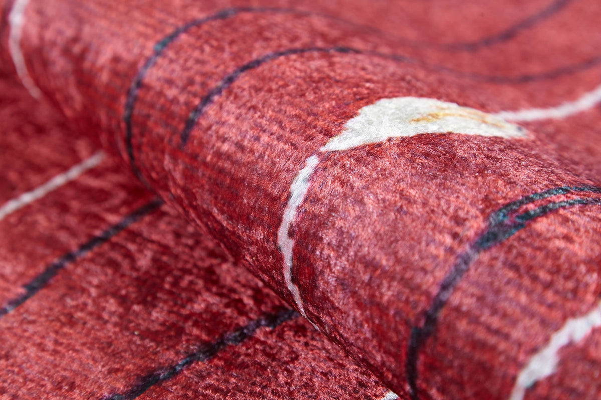 Close-up of the Secret Garden - Washable Rug - JR1656 (Custom Size), featuring a red textured surface with curved black and white lines; its abstract pattern is perfect for high-traffic areas and easy cleaning.