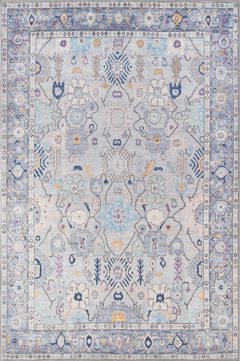 The Seraphix Pastel Bordered Washable Rug - LCC3011 (Custom Size) features a light blue and cream background with detailed floral and geometric patterns in blue, yellow, and lavender—ideal for high-traffic areas.