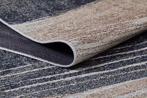 Load image 1 in gallery view. A close-up of the Serene Swirls - Washable Rug - JR952 (Custom Size) in bronze and brown, featuring a textured striped pattern in beige and dark gray—perfect for high-traffic areas with its foldable, washable design.