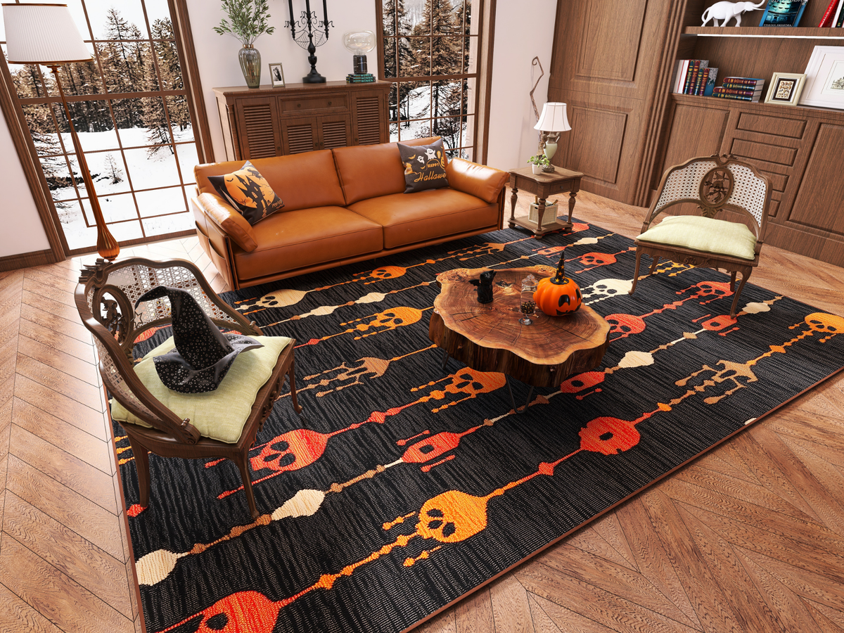 A cozy living room features a brown sofa, two chairs, a wooden coffee table topped with a pumpkin, and the Skull Lanterns - Washable Rug - HLW005 (Custom Size), perfect for high-traffic areas. Large windows showcase a forest view.