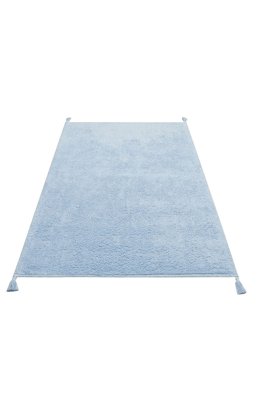 Load image 1 in gallery view. The Sky Nap - Washable Shaggy - CBNPLAIN is a rectangular soft blue cotton rug with a fuzzy shaggy texture and small tassels at each corner, shown on a white background.