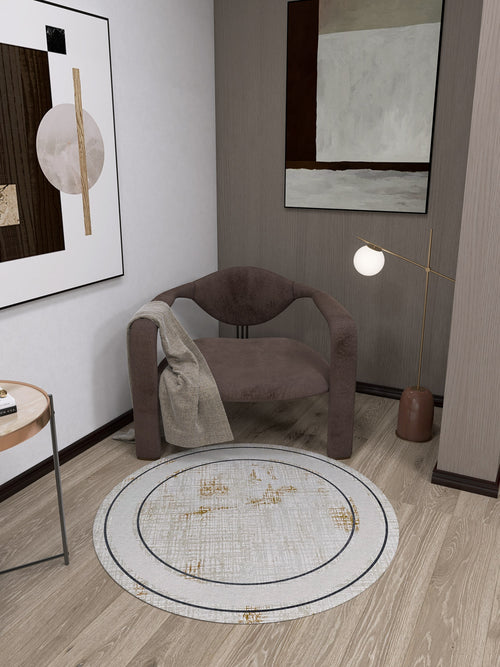 Load image 1 in gallery view. A cozy corner with a modern brown armchair, beige blanket, floor lamp, abstract wall art, and the Sleek and Contemporary - Washable Rug - JR1365—ideal for allergy-sensitive homes seeking minimalist style.