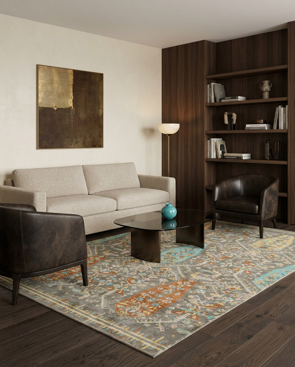 Grey traditional rug with orange and teal floral medallion patterns, styled in a modern living room.
