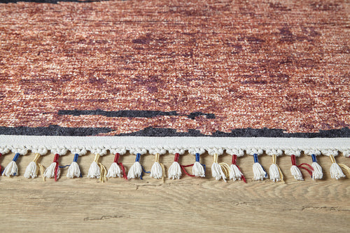 Load image 1 in gallery view. A close-up of the Soft Brushed - Washable Rug - JR5056 (Custom Size), featuring a multicolor reddish-brown and black pattern with beige tassels accented by red and blue threads—ideal for high-traffic areas.