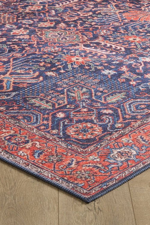 Load image 1 in gallery view. The Solstice Red Navy Washable Rug - LCC3026 (Custom Size) features intricate geometric and floral patterns in blue, red, and orange with detailed borders—durable and ideal for high-traffic areas.
