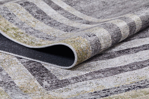 Load image 1 in gallery view. A close-up of the Sophisticated Trellis - Washable Rug - JR1194 (Custom Size) shows its folded, textured surface, striped geometric pattern in gray, beige, and light yellow; lifted edge highlights its thickness and woven detail—perfect for high-traffic areas.