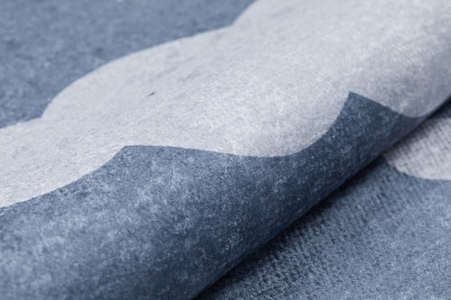 Load image 1 in gallery view. A close-up of the Starry Cloudscape - Machine-Washable Rug JRC045 shows its blue and light-gray wave-like pattern and textured, soft surface—ideal for adding style and durability to high-traffic spaces. Custom sizes available.