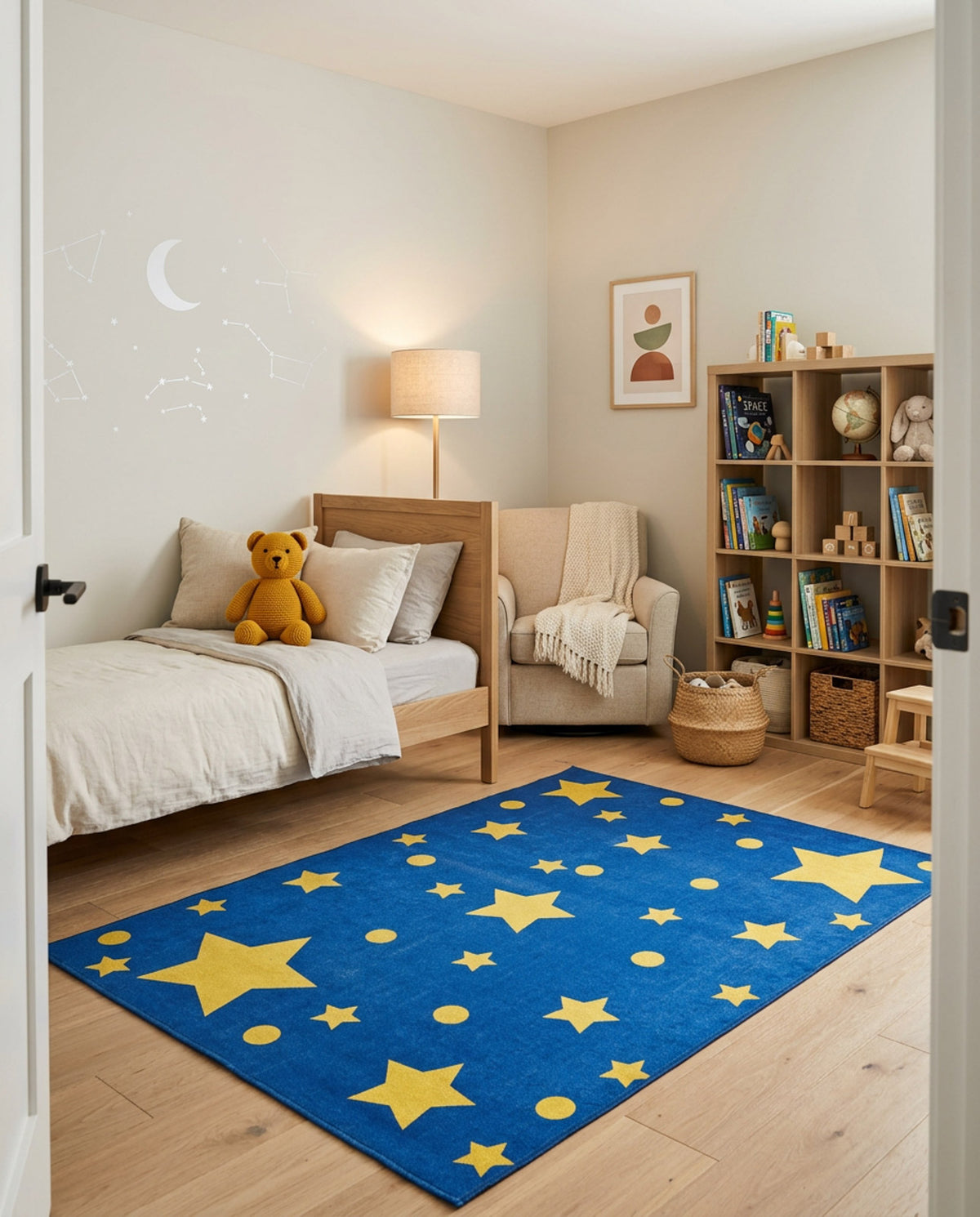 Blue rug with yellow stars and dots, styled in a child's bedroom.