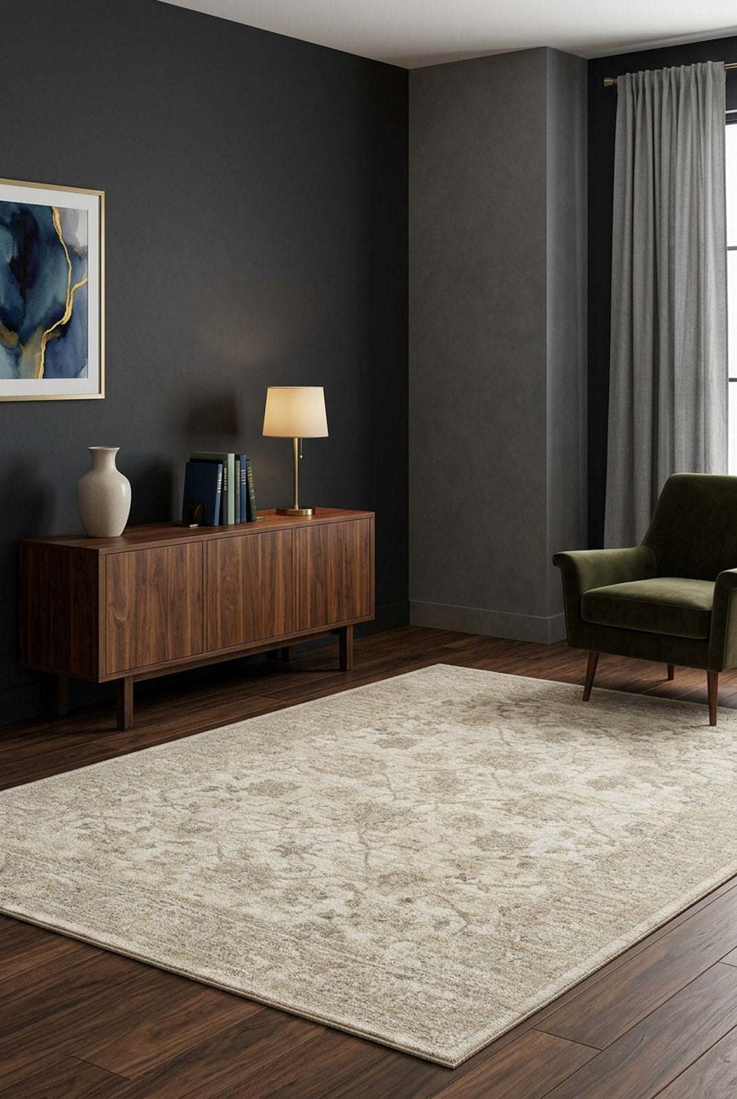 Modern living room with dark walls, a wooden sideboard with a lamp, books, and vase, an abstract painting, green armchair, large window with gray curtains, and the Stone Garden Area Rug APX1961 on a dark wood floor.