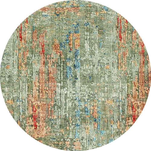 Load image 1 in gallery view. Round rug with an abstract, distressed vertical pattern in sage green, rust orange, and blue on a white background.