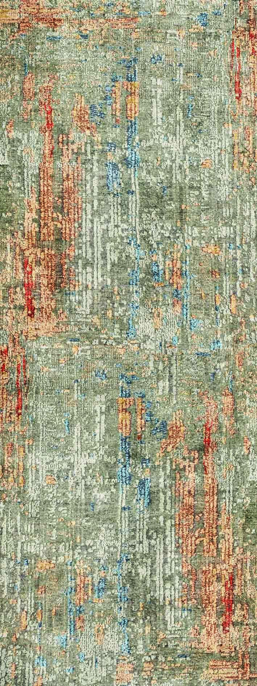 Load image 1 in gallery view. Sage green rug with a distressed, abstract vertical pattern in rust orange and bright blue accents.