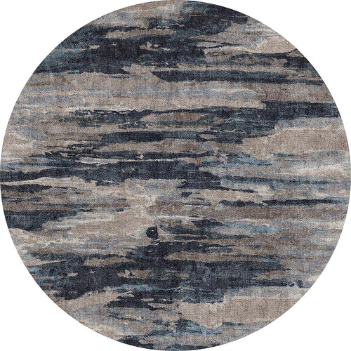 Load image 1 in gallery view. Round rug with an abstract, horizontal layered pattern in shades of navy blue, charcoal, and taupe.