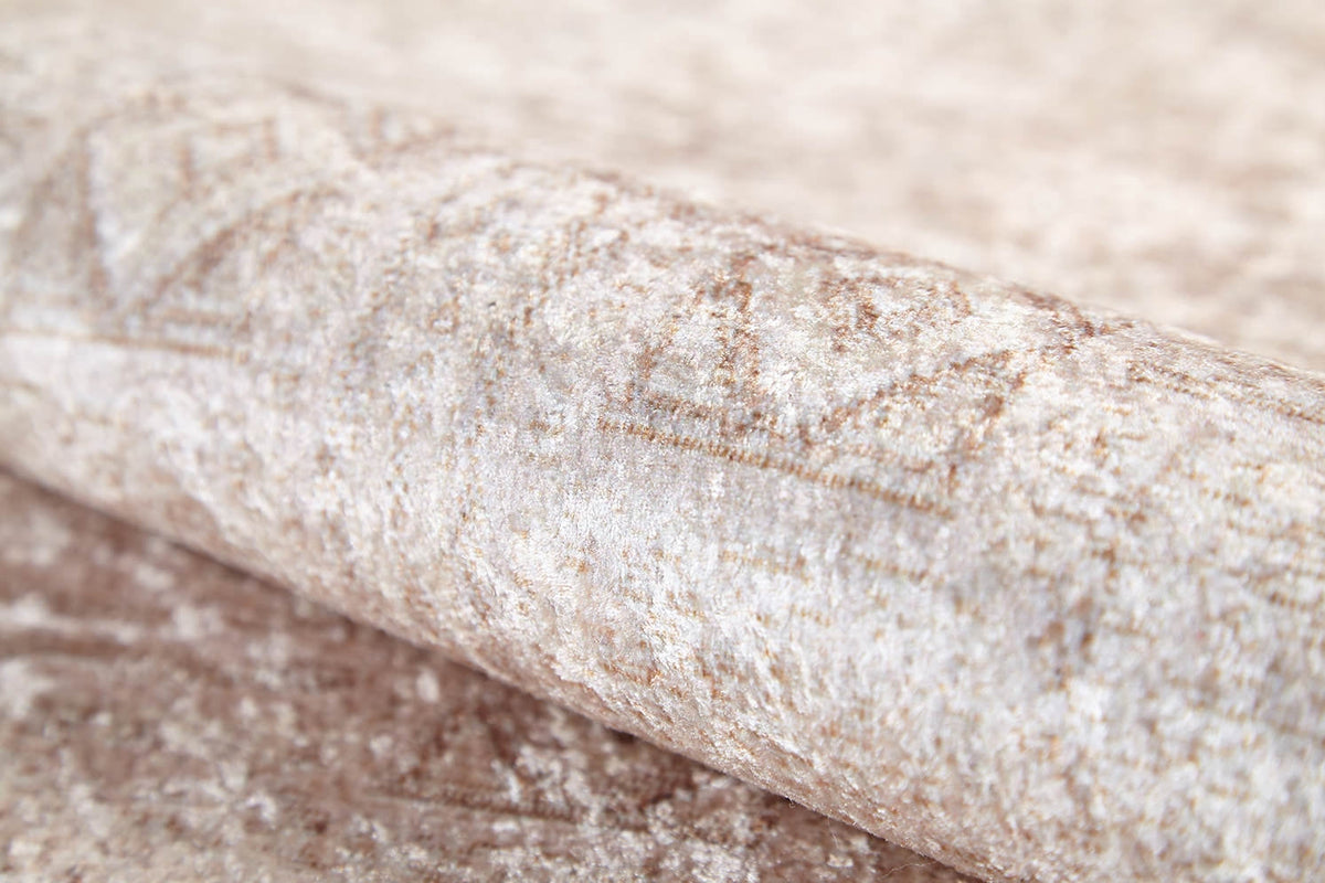 A close-up of the Sunset Fade - Washable Rug - JR1878 (Custom Size), featuring a textured surface in blended cream and beige tones with a subtle geometric pattern, reminiscent of distressed, light brown and cream decor.