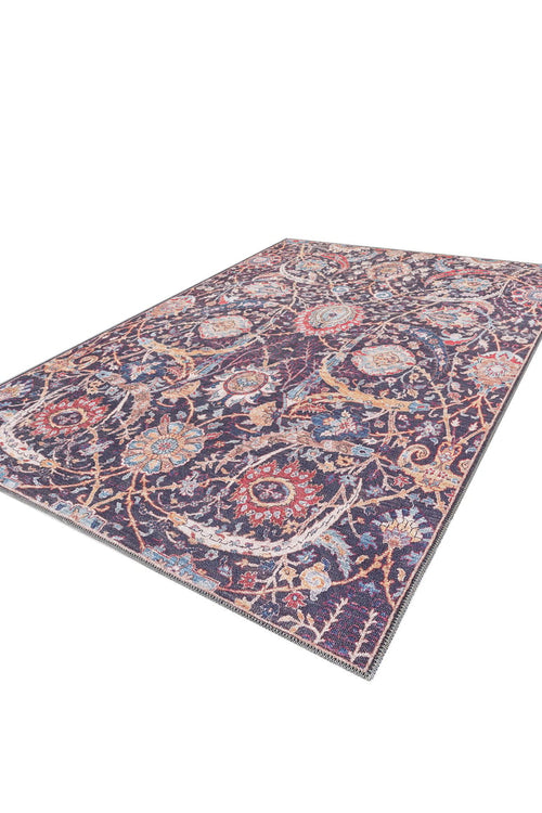 Load image 1 in gallery view. The Sylvanor Colorful Washable Rug - LCC3017 features an intricate floral and paisley design on a dark purple background, perfect for high-traffic spaces and ideal for stylish, easy-care living.
