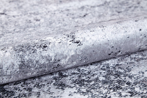 Load image 1 in gallery view. A close-up of the Techno Flux - Washable Rug - JR1814 (Custom Size), featuring a marbled silver and gray pattern—ideal for high-traffic spaces that want a sophisticated, modern touch.