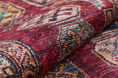 Load image 1 in gallery view. A close-up of the Time-Honored Textures - Washable Rug - JR40 (Custom Size) showcases intricate geometric patterns in red, gold, blue, and cream. The woven texture and detailed design are perfect for high-traffic areas.