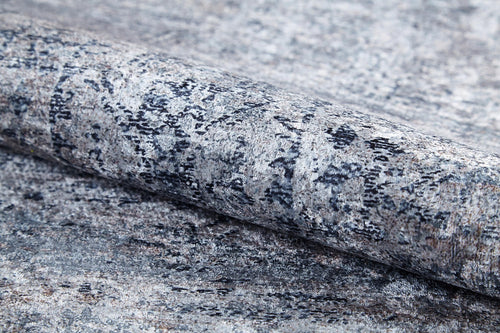 Load image 1 in gallery view. A close-up of the Timeless Scrollwork - Washable Rug - JR1774 (Custom Size) shows its textured, stone-like gray and black pattern, highlighting its durable design ideal for high-traffic areas.