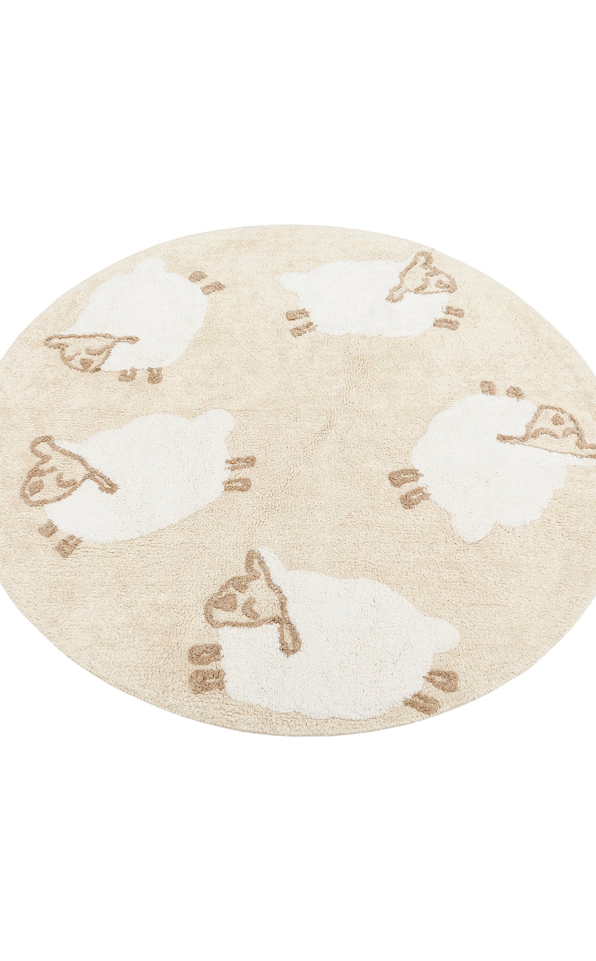 The Tiny Motion - Washable Shaggy - CBN11 is a round beige cotton shag rug with five white cartoon sheep featuring brown faces, ears, legs, and tails, evenly spaced around the design.