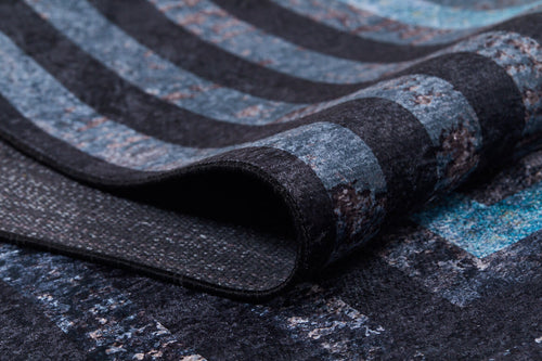 Load image 1 in gallery view. A close-up of the Traditional and Timeless - Washable Rug - JR1408 (Custom Size), partially folded to show its textured surface with blue, gray, and black stripes and sturdy backing—perfect for high-traffic areas.