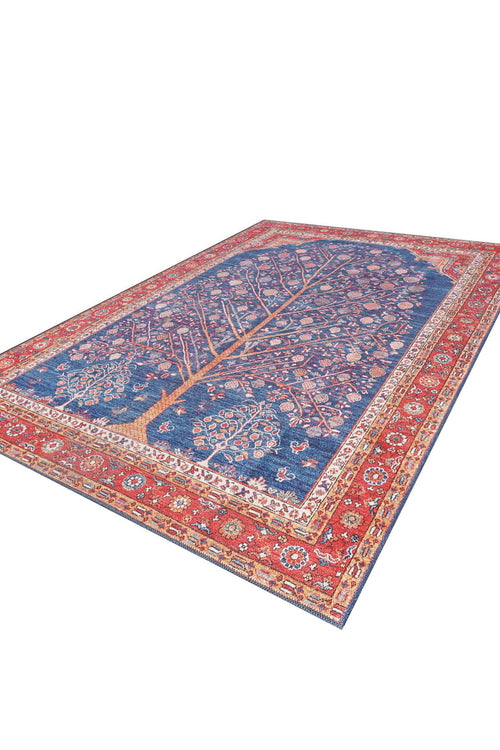 Load image 1 in gallery view. The Tree of Plenty Red Blue Washable Rug (LCC3031) features a blue tree-of-life center, wide red floral border, and intricate details—ideal for allergy-sensitive or high-traffic spaces.