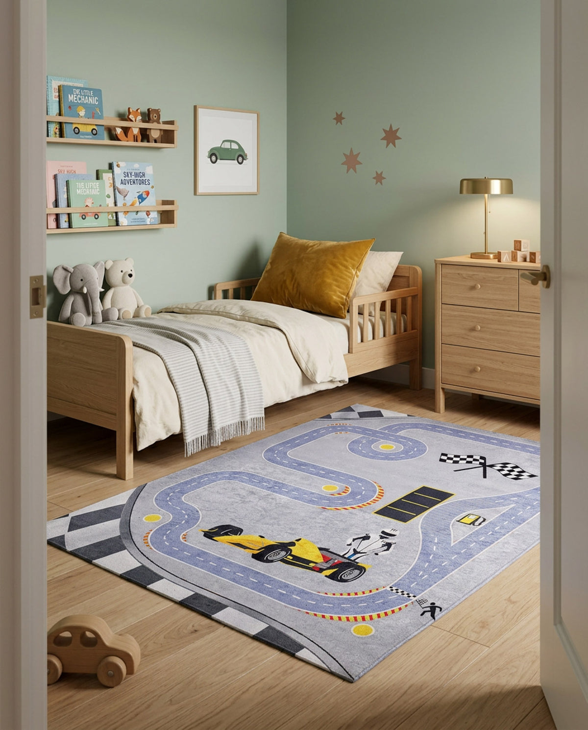 Grey rug with a blue racetrack pattern, yellow race car, and checkered flags, styled in a child's bedroom.