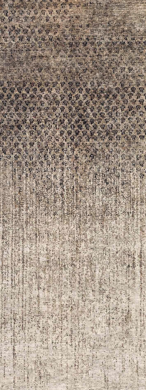 Load image 1 in gallery view. Charcoal and beige rug with a distressed, gradient ombre pattern transitioning from dark geometric motifs to a light fade.